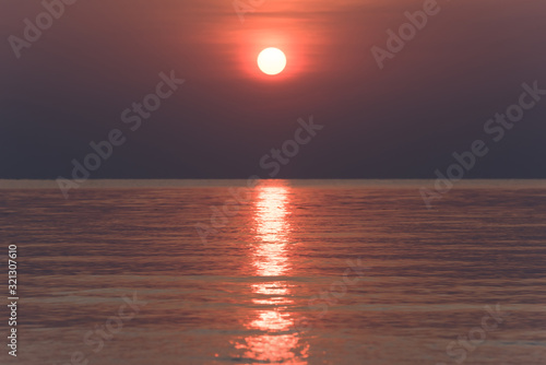Fototapeta Naklejka Na Ścianę i Meble -  Beautiful sunset at the sea