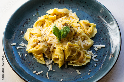 Tortellini with Parmesan cheese. Typical dish of Italy