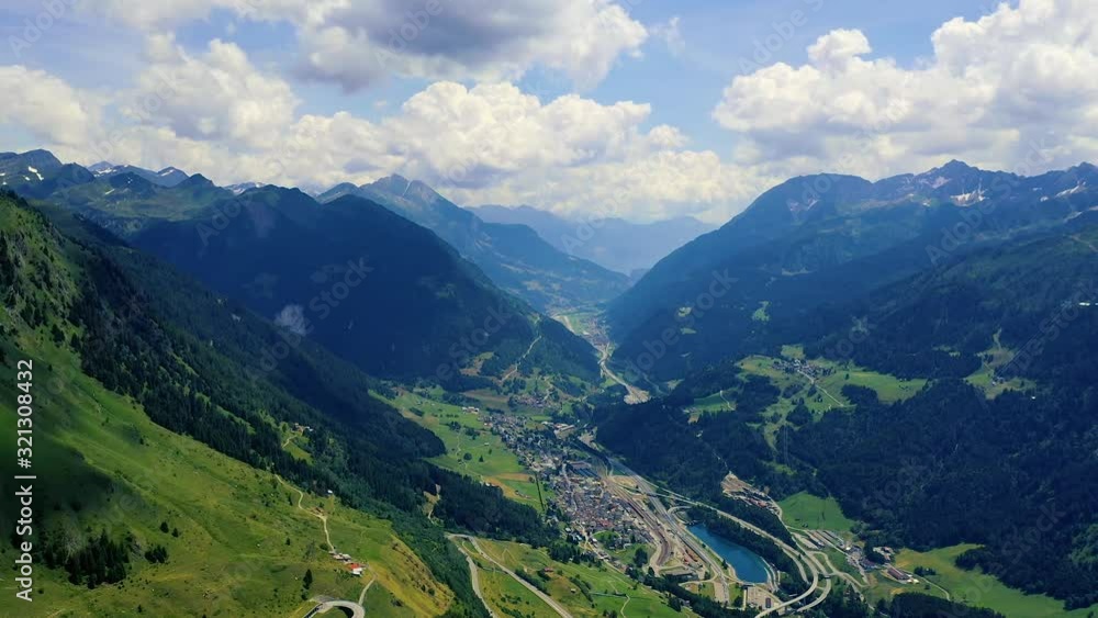 Flying over Val Bedretto and the city of Airolo in the Swiss Alps, Switzerland Flying over Val Bedretto and the city of Airolo in the Swiss Alps, Switzerland