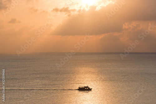 Traditional Longtail Boat at Sunset in Koh Tao Thailand