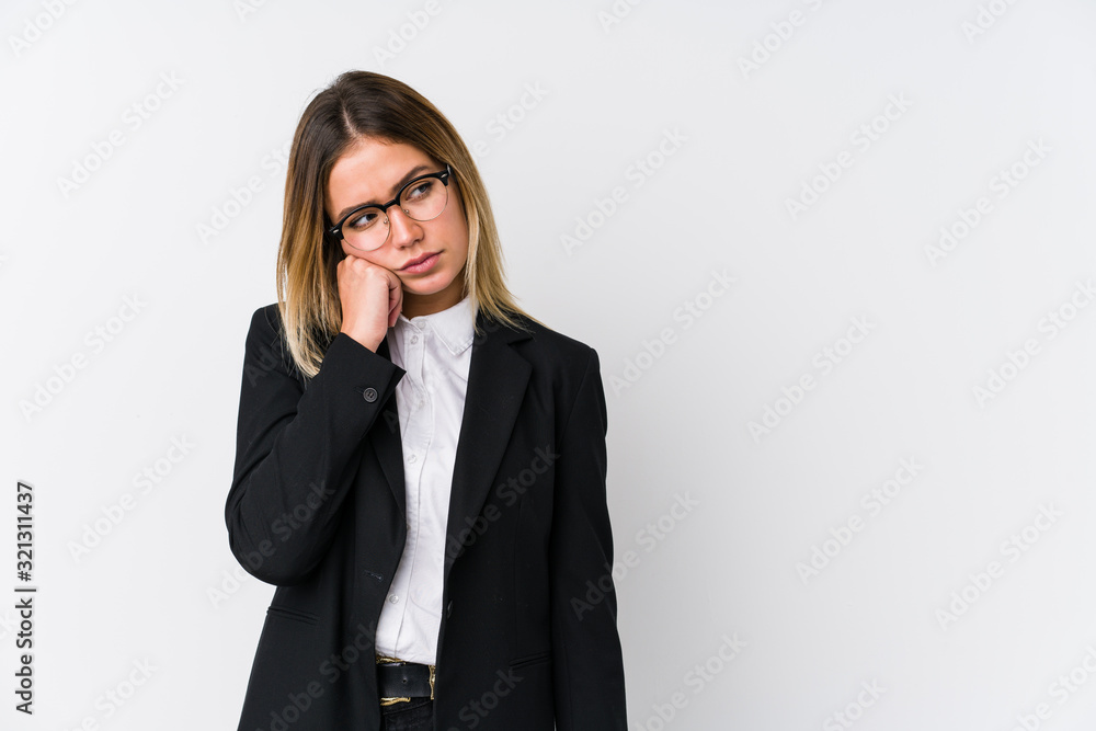Young business caucasian woman who feels sad and pensive, looking at copy space. Young business caucasian woman who feels sad and pensive, looking at copy space.