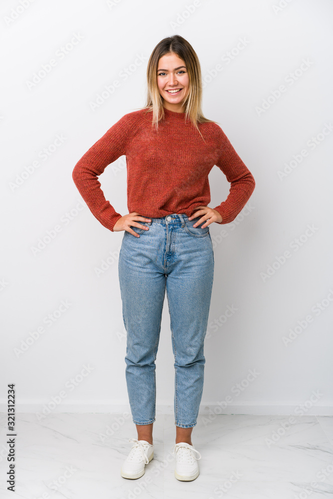 © Asier - Full body young caucasian woman confident keeping hands on hips. © Asier - Full body young caucasian woman confident keeping hands on hips.