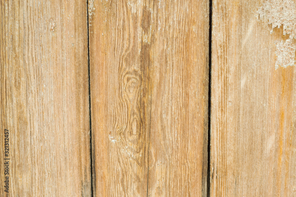 Fototapeta premium Old brown wooden background with vertical boards.