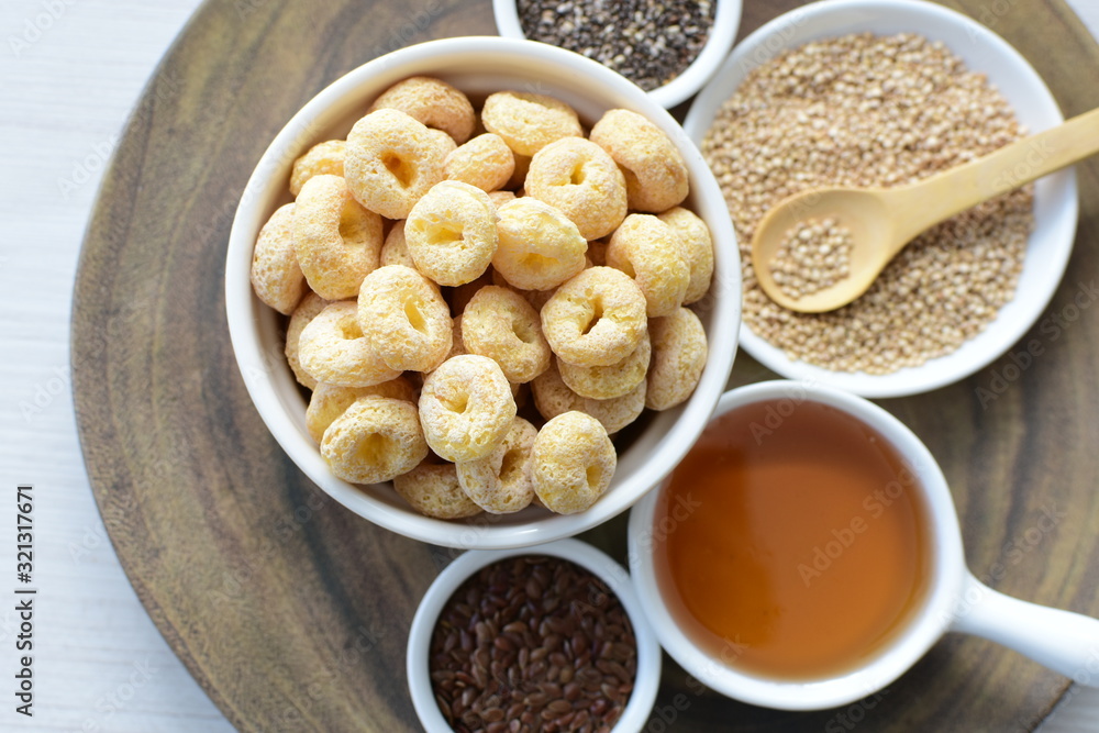 Quinoa cereal, accompanied by seeds and honey Quinoa cereal, accompanied by seeds and honey
