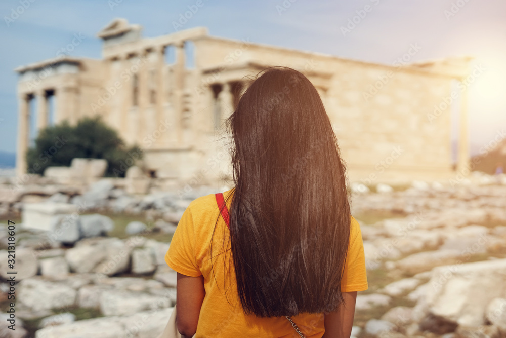 Hipster Traveler sightseeing and enjoying sun in the Acropolis