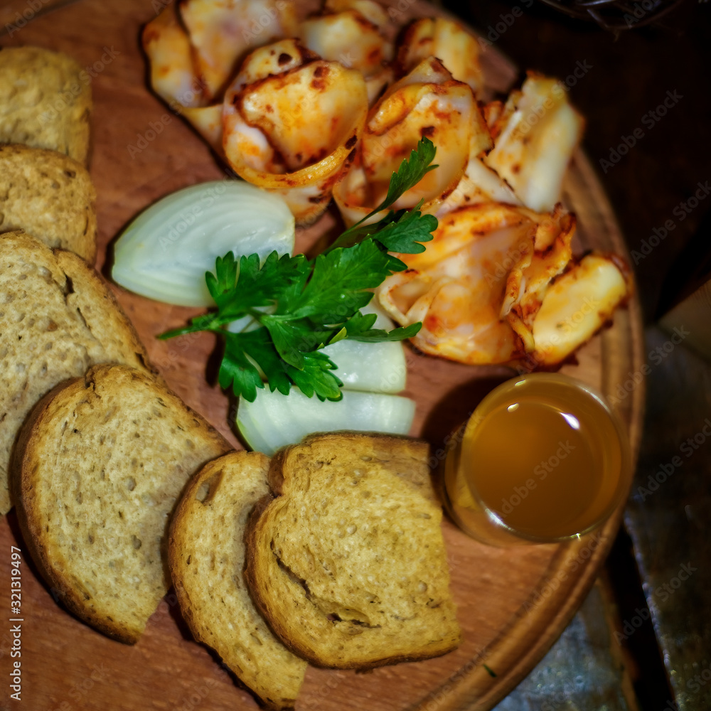 Still life with onion, parsley, rye bread, lard 'salo' in ukrainian