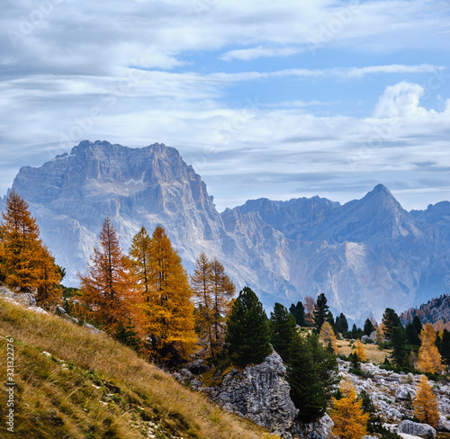 Cloudy morning autumn alpine Dolomites mountain scene. Peaceful view near Valparola and Falzarego Path, Belluno, Italy.