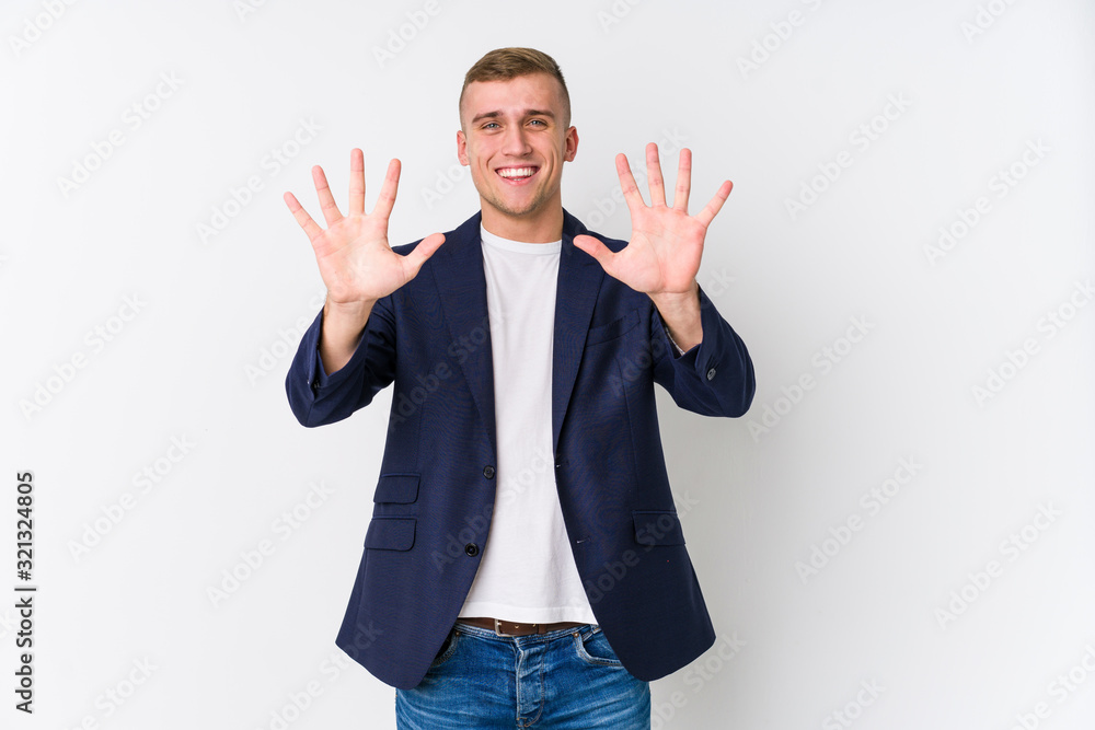 Young business caucasian man showing number ten with hands. Young business caucasian man showing number ten with hands.