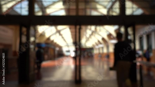 Blur Slow motion video of People passing through Wellington Railway Station, New Zealand