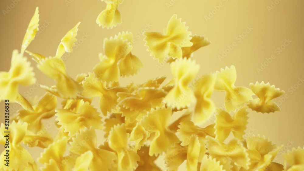 Super slow motion of flying uncooked italian pasta. Filmed on high speed cinema camera, 1000 fps. Super slow motion of flying uncooked italian pasta. Filmed on high speed cinema camera, 1000 fps.