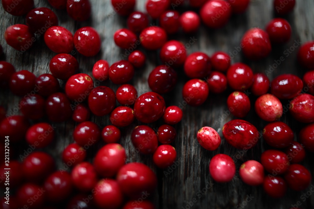 fresh cranberries on a wooden background fresh cranberries on a wooden background