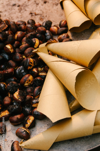 Canvas Print chestnuts ares old in the street of rome in winter time, christmas holidays, street food image