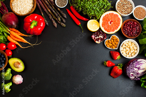 Group of healthy food on black background