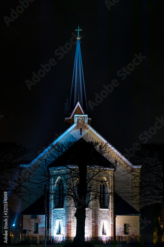 Lutheran church at night in Pinki parish, Latvia