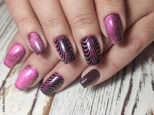 фотографія beautiful nail art manicure on the background