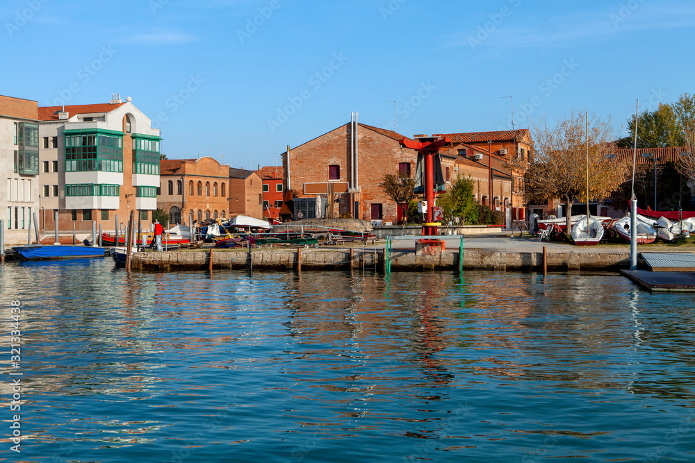 The boat docks on the lagoon