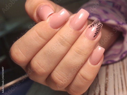 Beautiful woman s nails with beautiful christmas manicure