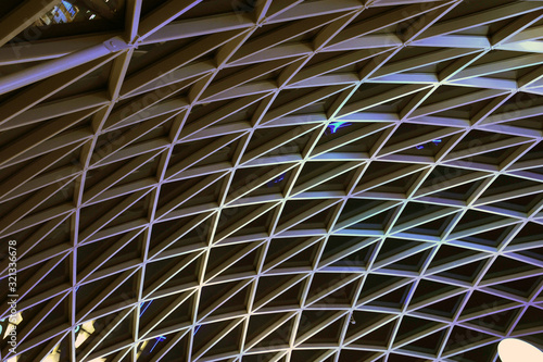 A canopy made of polycarbonate arc . Metal construction.