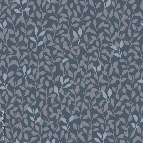 Seamless vector pattern with dense allover hand-drawn leaves in grey and blue on a dark grey background. Lush modern botanical repeat great for textiles, packaging, wrapping paper, gifts, home decor.