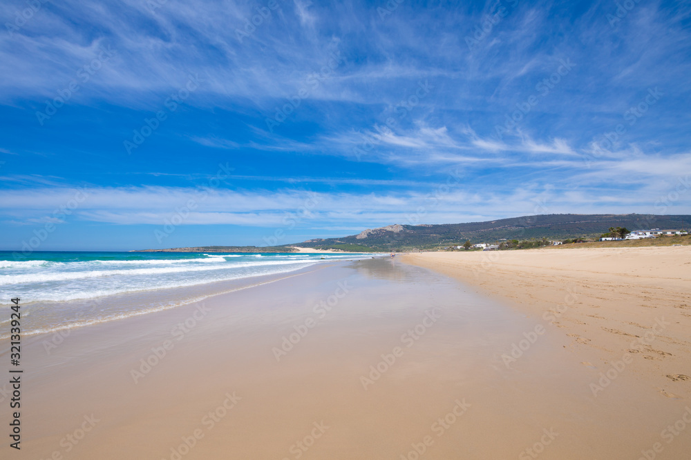 beautiful scenery from seashore of sandy and lonely Bolonia Beach, in Tarifa (Cadiz, Andalusia, Spain) beautiful scenery from seashore of sandy and lonely Bolonia Beach, in Tarifa (Cadiz, Andalusia, Spain)