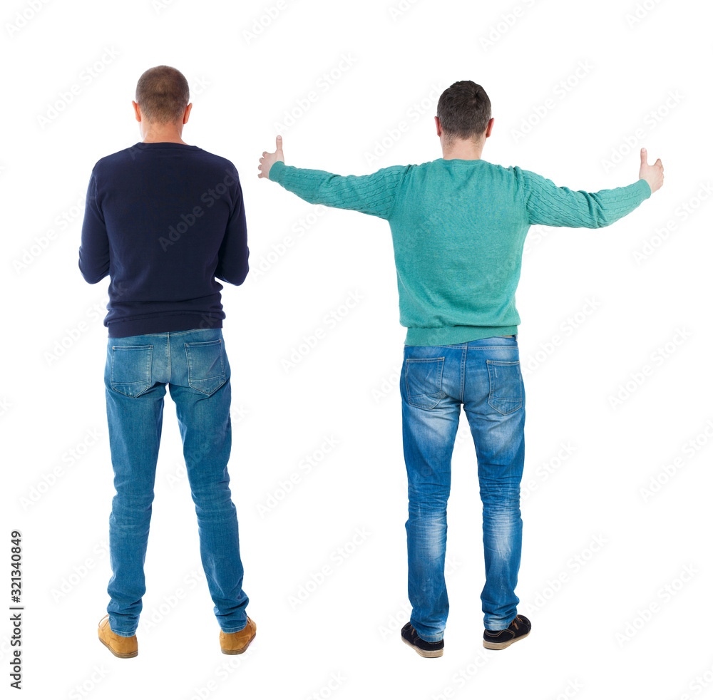 Back view of two man in sweater. Back view of two man in sweater.