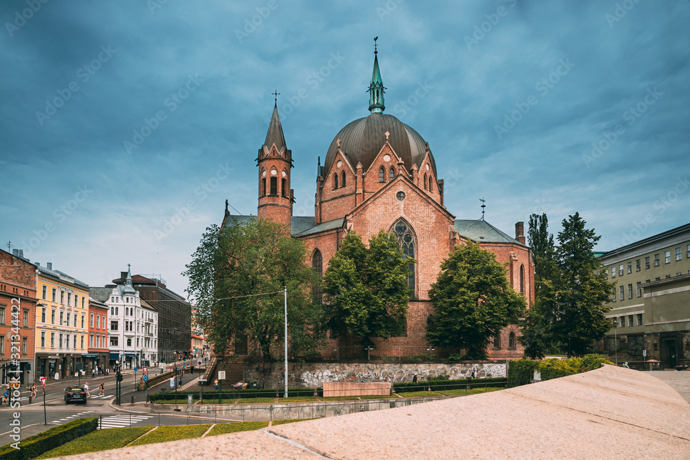 Fototapeta premium Oslo, Norway. Trefoldighetskirken - Holy Trinity Church at Akersgata Street. Summer Day