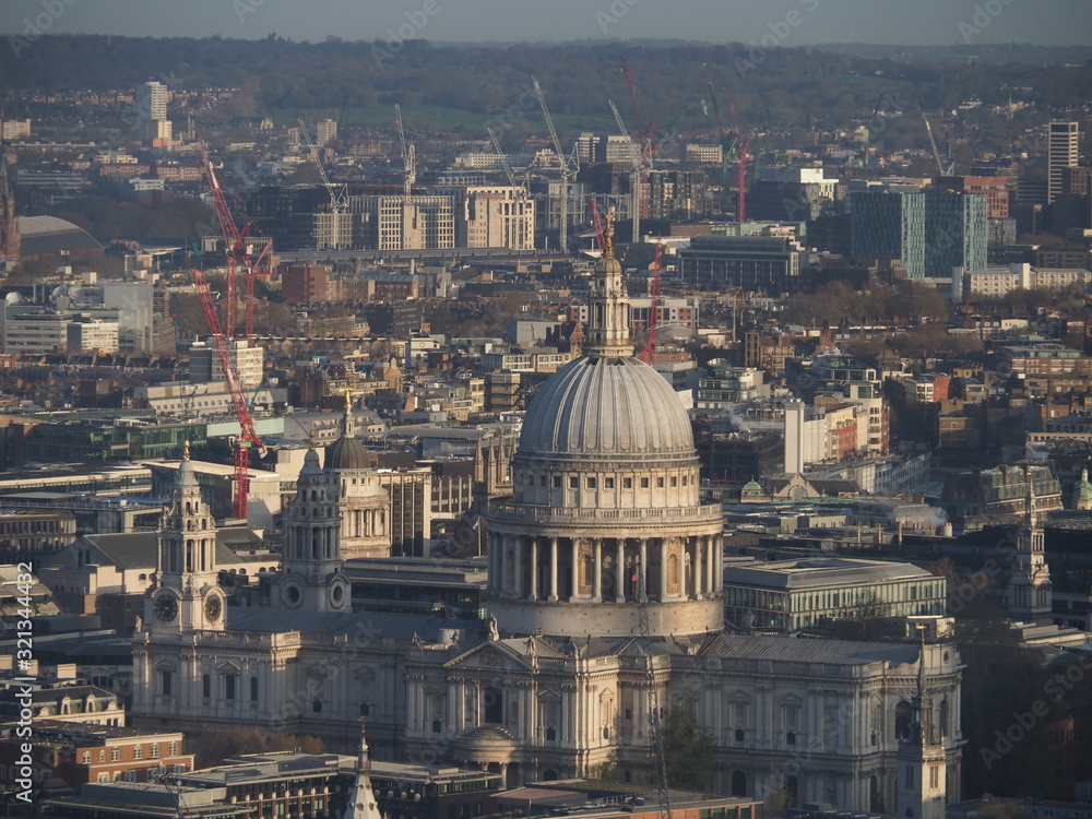 an aerial telephoto view of St.Pauls cathedral in London daytime
