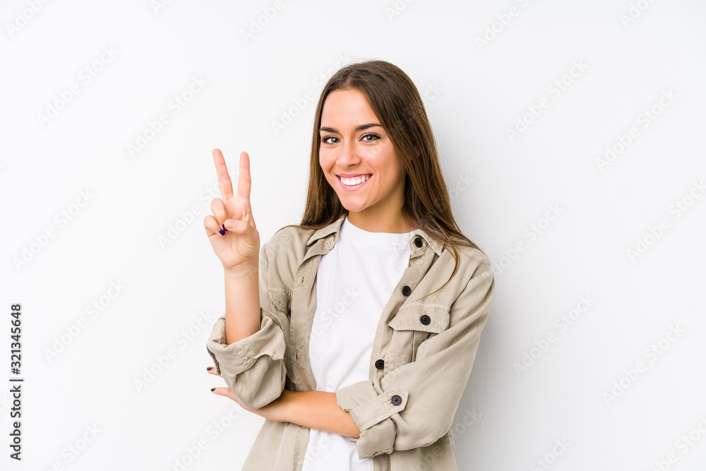 Young caucasian woman isolated showing number two with fingers. Young caucasian woman isolated showing number two with fingers.