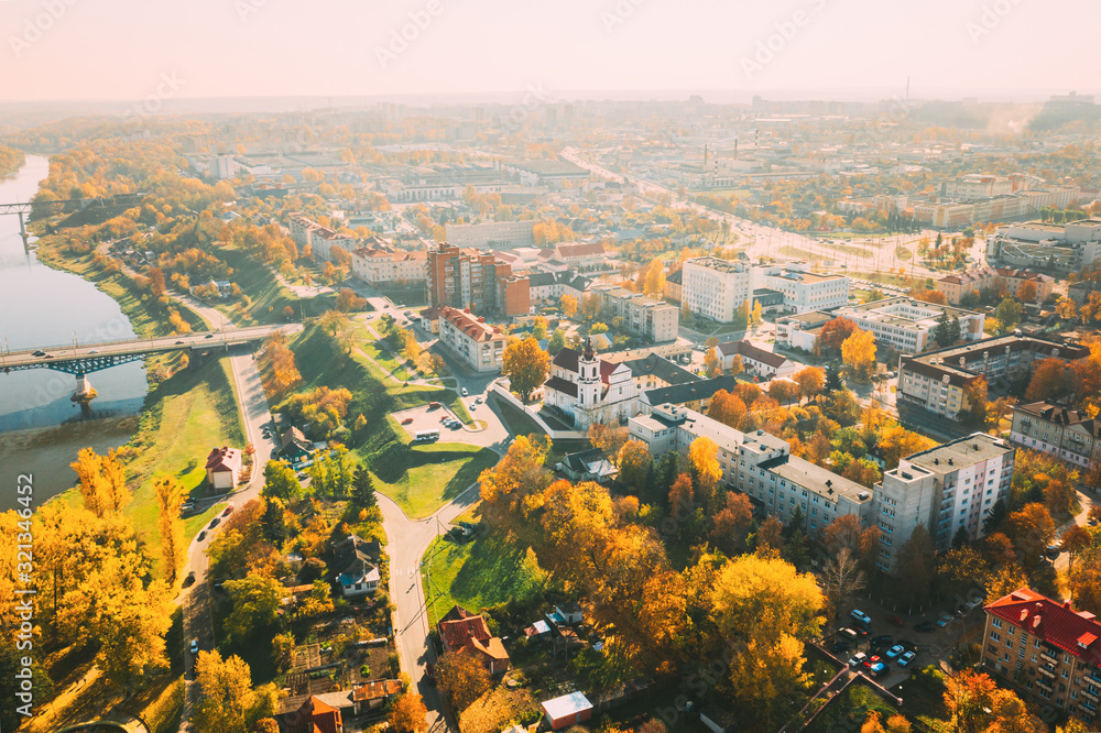 Grodno, Belarus. Aerial Bird's-eye View Of Hrodna Cityscape Skyline. Franciscan Monastery - Church of the Virgin Mary In Sunny Autumn Day Grodno, Belarus. Aerial Bird's-eye View Of Hrodna Cityscape Skyline. Franciscan Monastery - Church of the Virgin Mary In Sunny Autumn Day