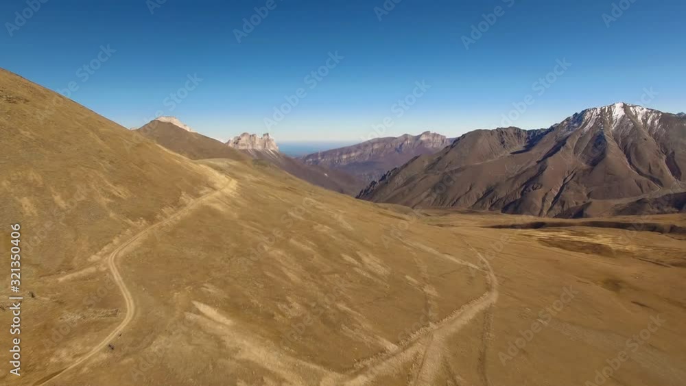 Flight in mountains. Beautiful view of mountain rocks, nature of the North Caucasus