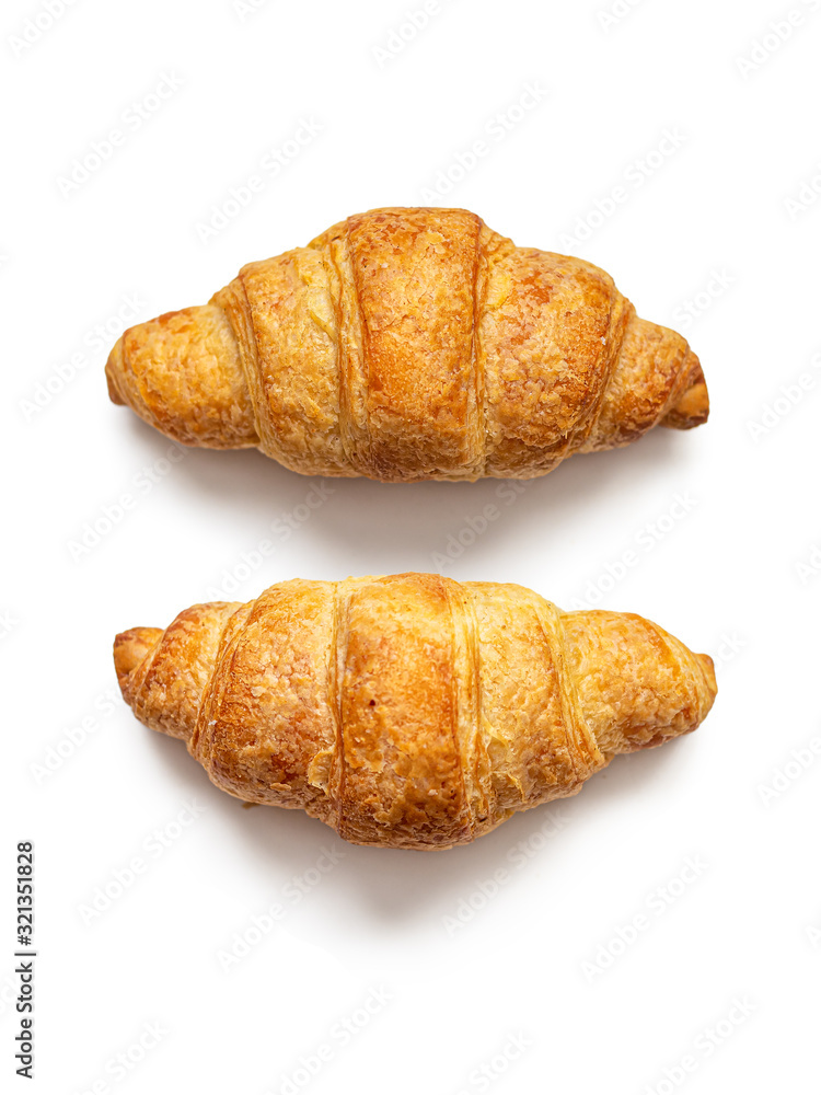 Croissants with a Golden crust on a white background Croissants with a Golden crust on a white background