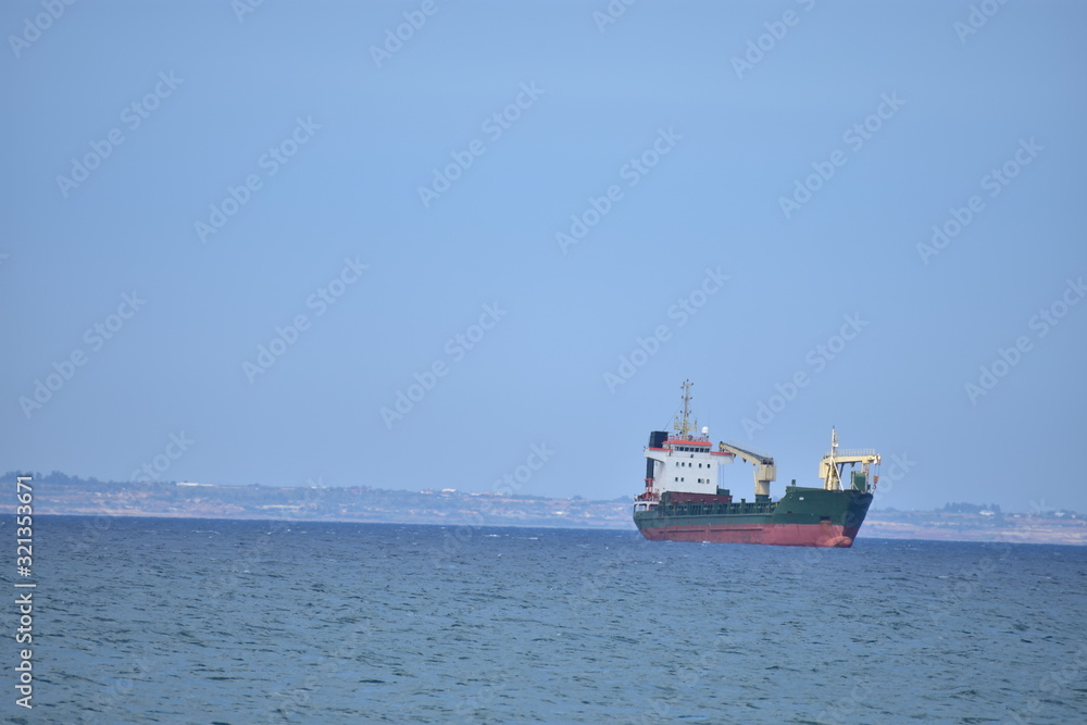 Seascape with a boat in the Mediterranean Sea from Larnaca Cyprus