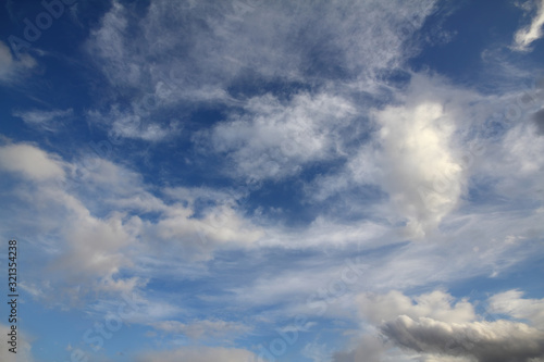 Fototapeta Naklejka Na Ścianę i Meble -  The vast blue sky and clouds sky. blue sky background with tiny clouds. blue sky panorama.