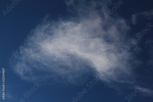 The vast blue sky and clouds sky. blue sky background with tiny clouds. blue sky panorama.