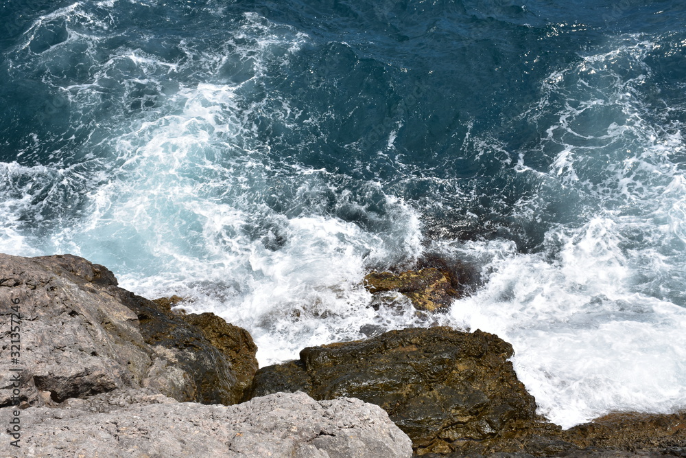 waves crashing on rocks waves crashing on rocks