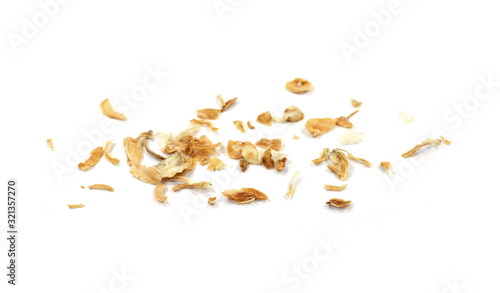 Dried Minced Onions on a White Background. Onion flakes isolated on white background.