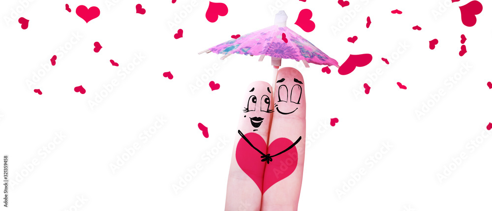 Fototapeta premium Zwei verliebte Finger mit Regenschirm