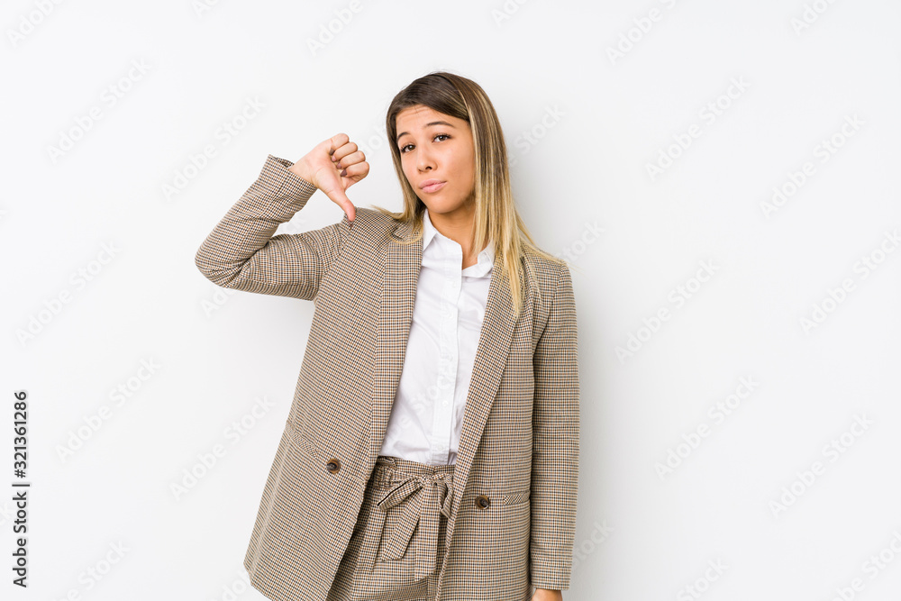 Young caucasian business woman isolated showing a dislike gesture, thumbs down. Disagreement concept. Young caucasian business woman isolated showing a dislike gesture, thumbs down. Disagreement concept.