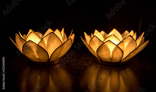 Lotus flower candles in the dark photo