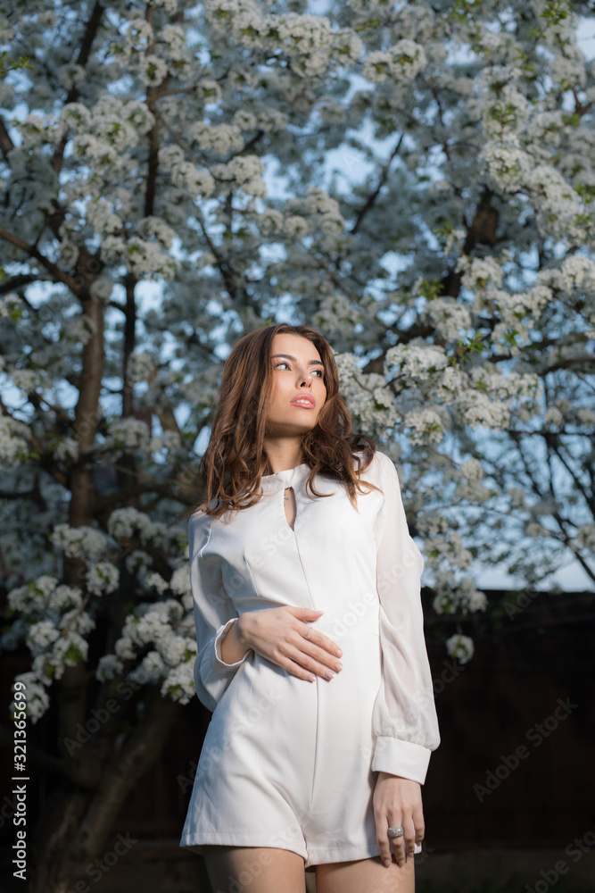Portrait of beautiful young girl in summer garden. Portrait of beautiful young girl in summer garden.