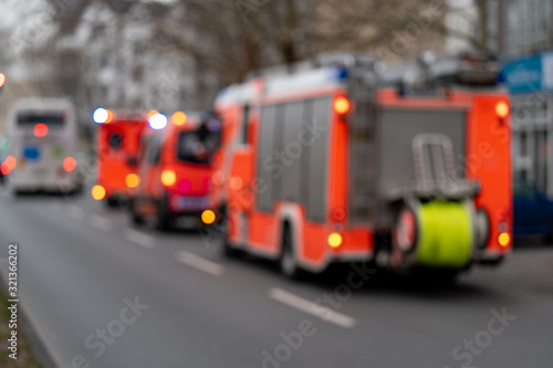 Abstract background - blurred fire truck in berlin city, germany