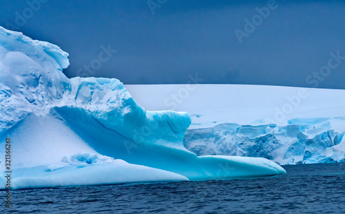 Floating Blue Iceberg Snow Glaciers Mountains Charlotte Bay Antarctica