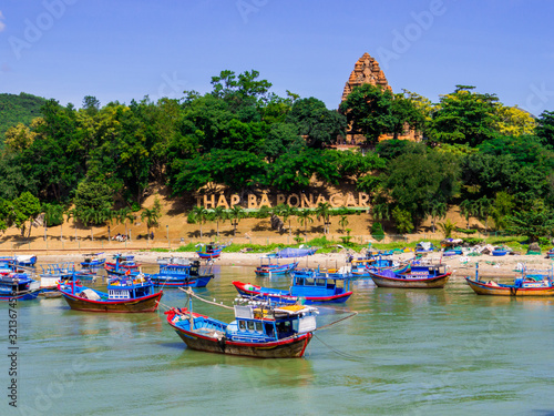 View of the Cai River with the Ponagar Tower in the background. In Nha Trang, Vietnam photo