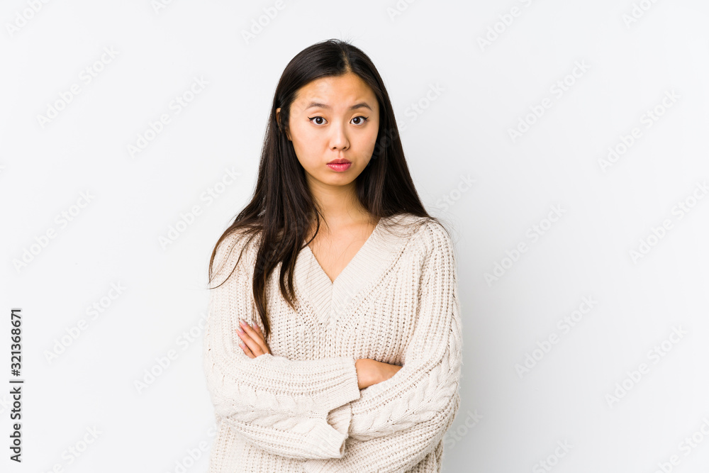 Young chinese woman isolated unhappy looking in camera with sarcastic expression. Young chinese woman isolated unhappy looking in camera with sarcastic expression.