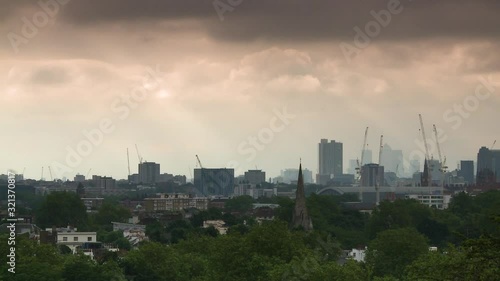 Wallpaper Mural A closeup panning shot of the landscape with multiple buildings and a Ferris wheel in the distance Torontodigital.ca