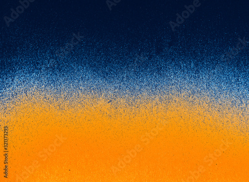 Injet grainy graduated background material in dark blue and orange tones with half-tone grainy transition for use in graphic design as a text backdrop.