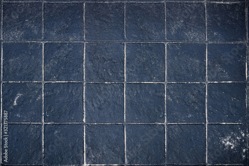 Black textured square floor stone tile