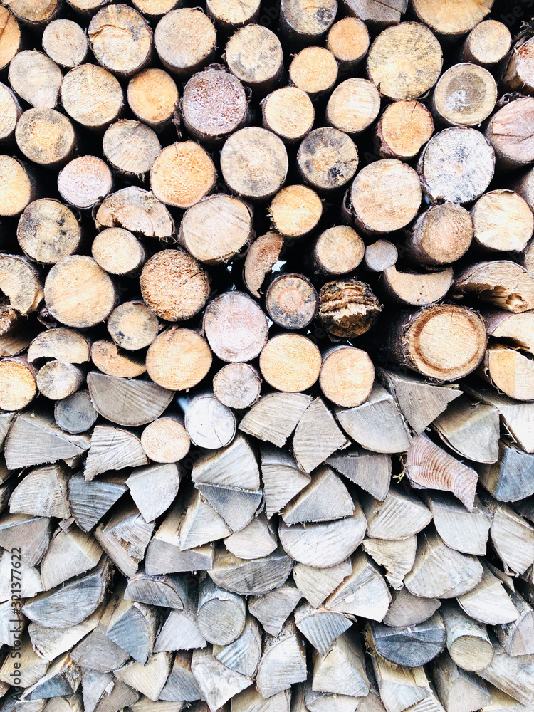 Section of old firewood texture background in retro style in Hallstatt, Austria, Europe Section of old firewood texture background in retro style in Hallstatt, Austria, Europe