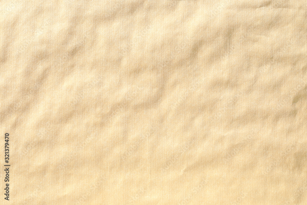 Naklejka premium Crumpled brown paper background texture