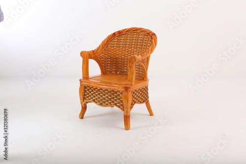 In some Asian countries and China  craftsmen use cane or wicker furniture on a white background. It can make people relaxed and happy. Usually this material can be used for backrest  rocking chair  ta